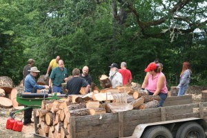 Gleaners work together to cut load and take wood to their sites to share with members.