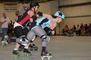 Sick Town jammer Ill Ninja breaks deflects a hit; photo by Tim Berg.