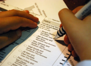 Voter filling out a ballot